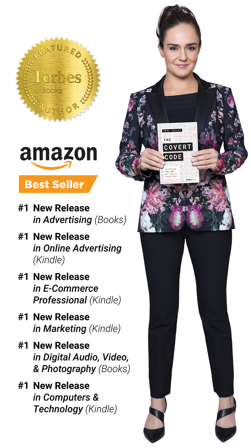 Anna Covert holding her book 'The Covert Code: Mastering the Art of Digital Marketing', standing confidently in a floral blazer and black pants. The image features badges indicating 'Forbes Books Featured Author' and 'Amazon Best Seller'.