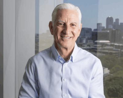Perry Kaufman, Strategic Advisor and Founder of PSK Consulting LLC in Dallas, Texas, smiling in a professional office setting. Featured guest on The Covert Code Podcast discussing leadership succession and guiding founder-led companies through financial and operational growth.
