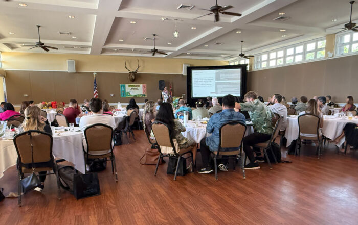 Audience attending a business presentation at a marketing seminar, featured in The Covert Code blog update on why Yotpo is no longer recommended