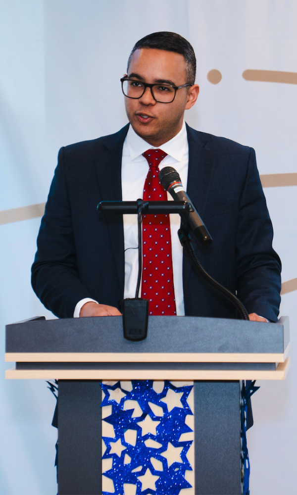 Robinson Aquino delivering a keynote presentation on small business growth, leadership development, and financial strategy